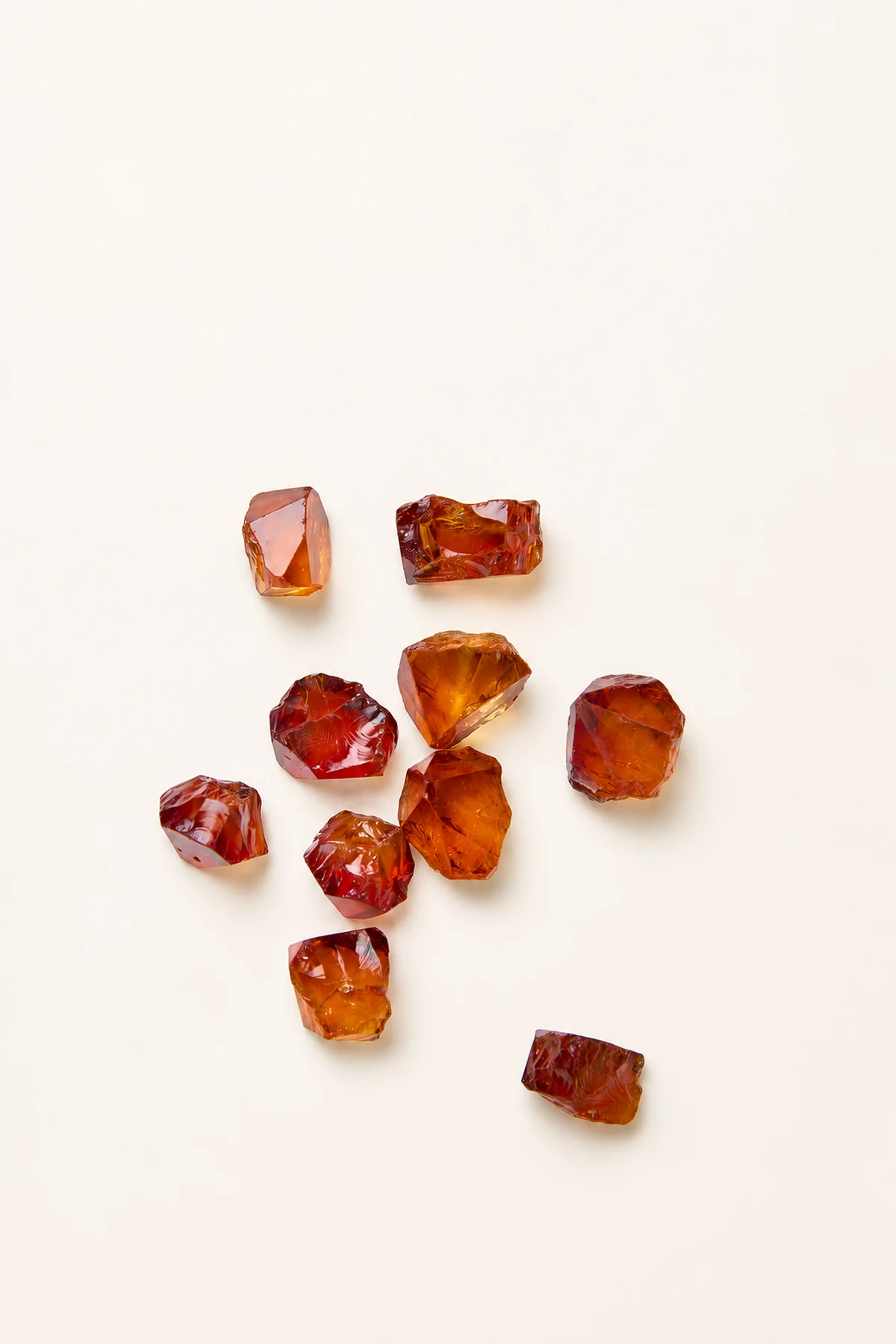 Warm golden rough stones on a pale surface