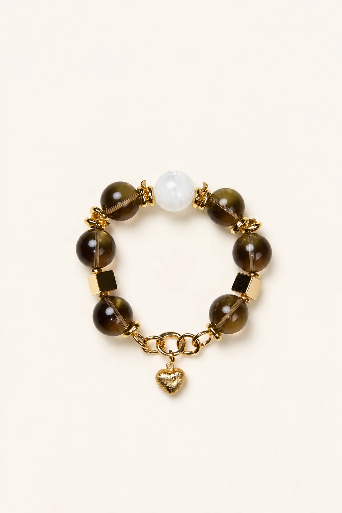 Tea-brown crystal bracelet with gold-coloured details and a heart charm
